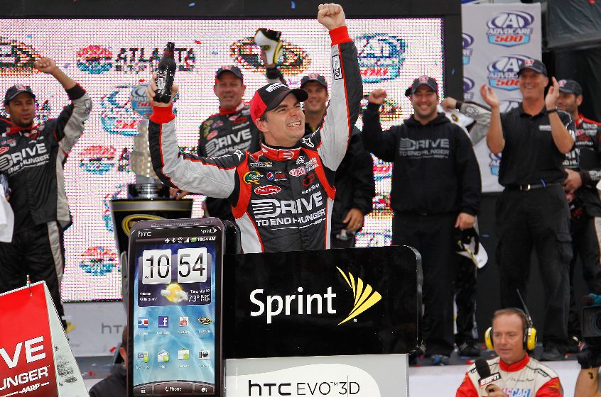 Credit: Geoff Burke/Getty Images for NASCAR Jeff Gordon, driver of the No. 24 Drive to End Hunger Chevrolet, celebrates in Victory Lane after winning the NASCAR Sprint Cup Series AdvoCare 500 at Atlanta Motor Speedway on Sept. 6 in Hampton, Ga.